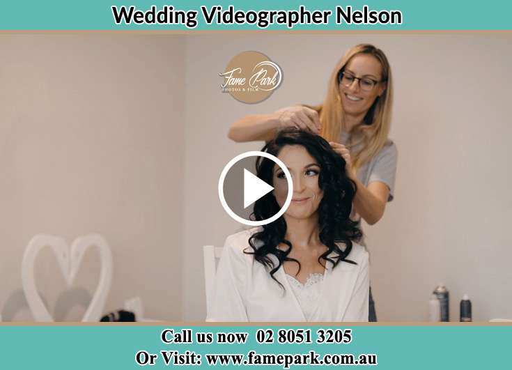 Bride's hair getting fixed by the stylish Nelson NSW 2765